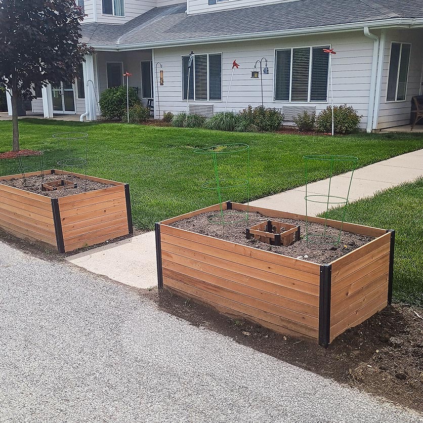 Large, rectangular wooden planters at Curtis Creek.